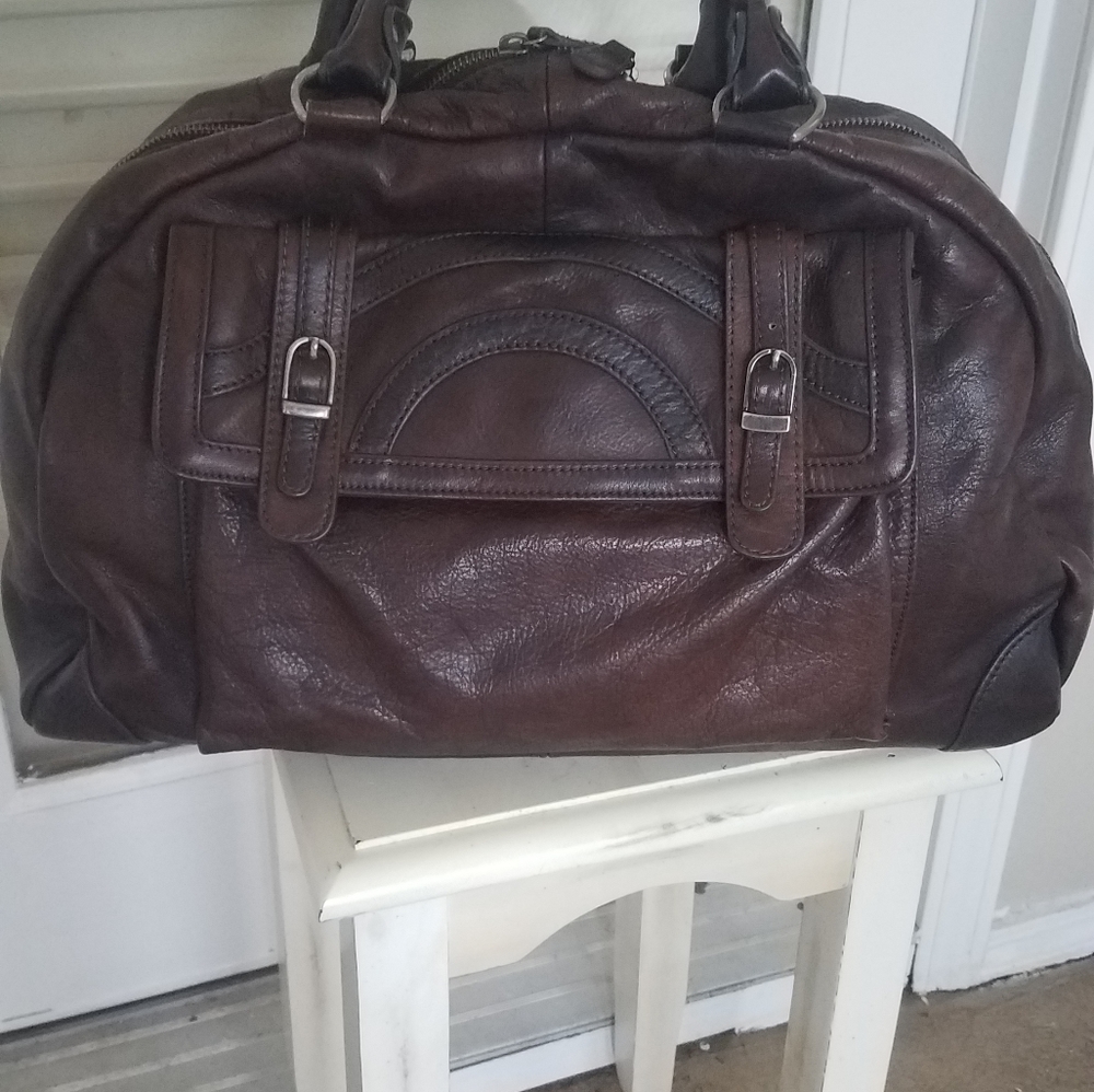 Laila Rowe over size purse